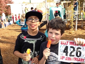 Fifth graders Cash Johnson and Tavis Turner celebrate their run with popsicles